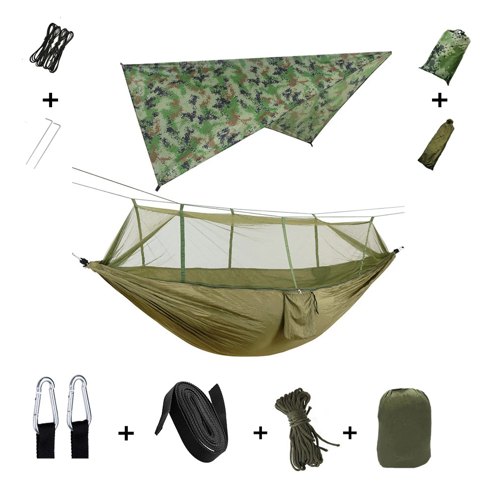 The Ultimate Outdoor Adventure Hammock Shelter System in military green, fully assembled with a matching camouflage tarp, displaying all included components.