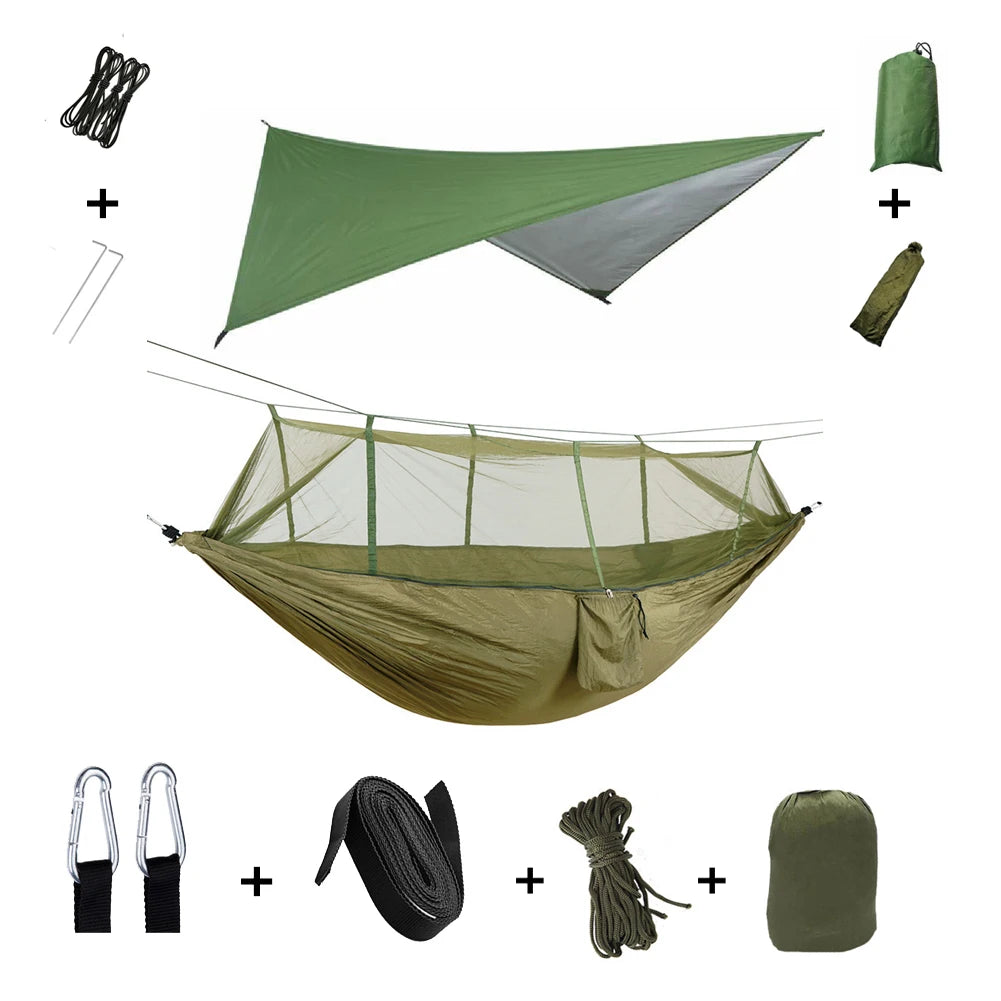 The Ultimate Outdoor Adventure Hammock Shelter System in military green, fully assembled with a matching green tarp, displaying all included components.